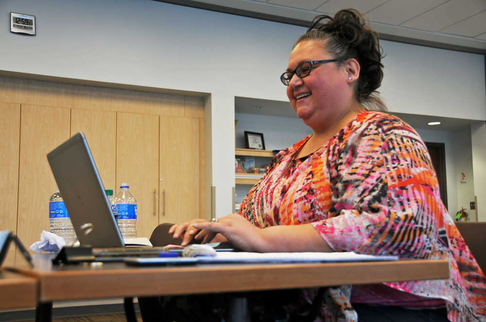 Photo by Elizabeth Earl/The Peninsula Clarion Tina Minster, a health care insurance navigator at Peninsula Community Health Services, handles the outreach and enrollment in the community. She regularly travels around and "sets up wherever they'll let me," she said.