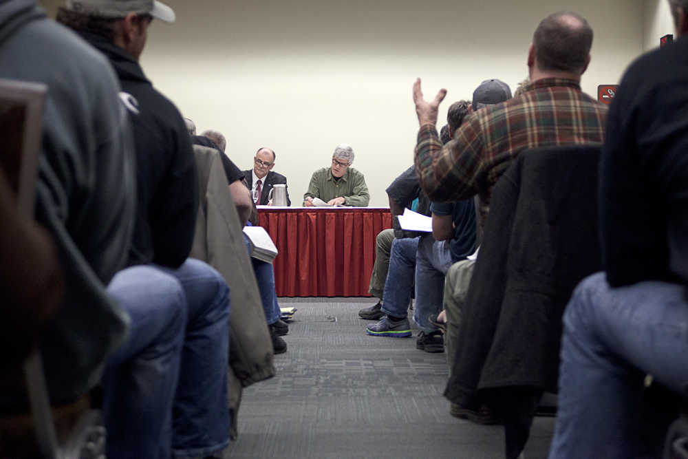 Photo by Rashah McChesney/Peninsula Clarion  Alaska Board of Fisheries members John Jensen and Tom Kluberton hear committee testimony during the triennial Upper Cook Inlet meeting Thursday Feb. 6, 2014 in Anchorage, Alaska.