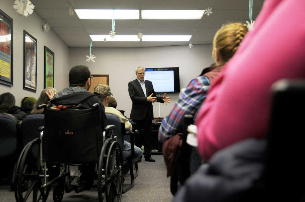 Photo by Elizabeth Earl/Peninsula Clarion Duane Mays, the director of the Senior and Disability Services division of the Alaska Department of Health and Social Services, presented options to revise the Medicaid waiver program to a small crowd in Kenai Tuesday night.