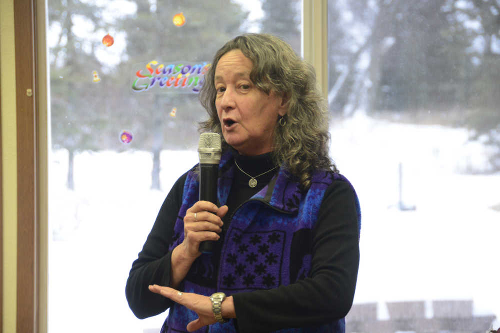 Photo by Megan Pacer/Peninsula Clarion The Independent Living Center Executive Director Joyanna Geisler explains the ins and outs of Veteran-Directed Home and Community Based Services to a room of veterans and their families on Wednesday, Dec. 16, 2015 at the Ninilchik Senior Center in Ninilchik, Alaska.