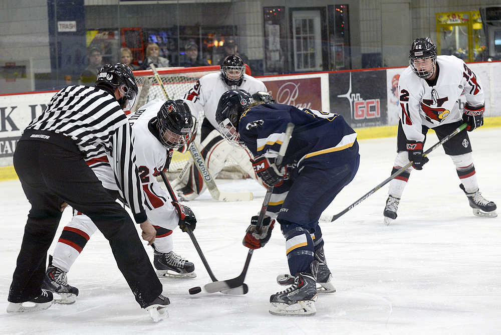Photo by Rashah McChesney/Peninsula Clarion Homer High School and Kenai Central High School square off for a game on Thursday Dec. 17, 2015 in Soldotna, Alaska.