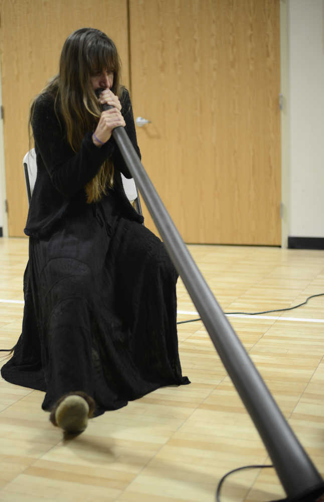 Photo by Megan Pacer/Peninsula Clarion Homer singer/songwriter Shawn Zuke plays the didgeridoo during a CD release concert on Sunday, Dec. 20, 2015 at the Sterling Community Center in Sterling, Alaska.