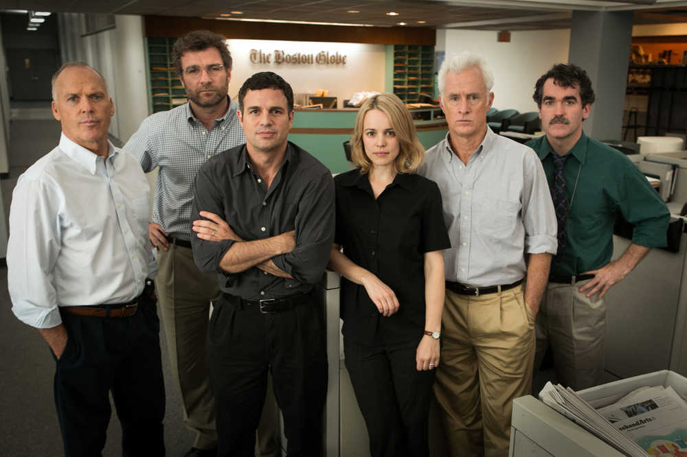 This photo provided by Open Road Films shows, Michael Keaton, from left,  Liev Schreiber, Mark Ruffalo, Rachel McAdams, John Slattery and Brian d'Arcy James in a scene from the film, "Spotlight." The film was nominated for a Golden Globe award for best motion picture drama on Thursday, Dec. 10, 2015. The 73rd Annual Golden Globes will be held on Jan. 10, 2016. (Kerry Hayes/Open Road Films via AP)