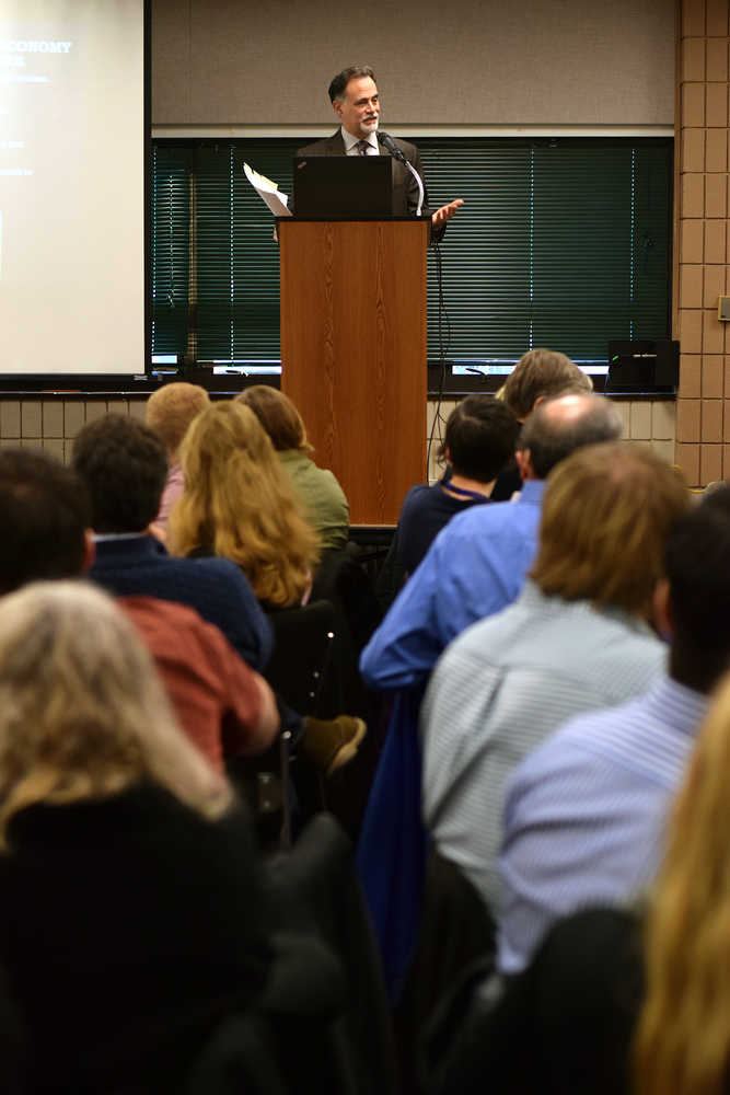 Photo by Rashah McChesney/Peninsula Clarion Sen. Peter Micciche, R-Soldotna, gives a presentation - focused primarily on the state's budget woes - on Tuesday Jan. 5, 2016 during a Chamber of Commerce luncheon at the Soldotna Sports Complex in Soldotna, Alaska.