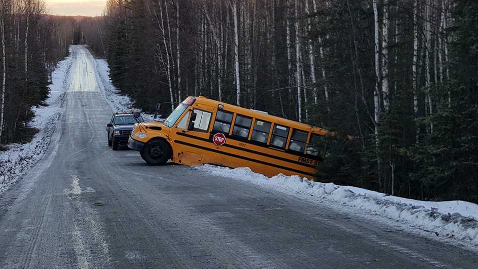 Photo courtesy Tamara Nelson A school bus slid off Adkins Road in Sterling Tuesday morning. No students were on the bus at the time.