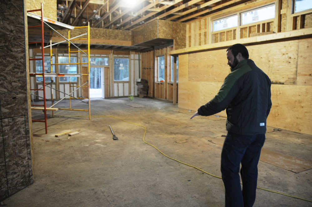 Photo by Elizabeth Earl/Peninsula Clarion Kenai River Brewing Company co-owner Doug Hogue stands in the future pub space of the company's new building on Forty-Seventh Street in Soldotna. The pub will have space for about 85 people at any one time, plus an outdoor patio, Hogue said.