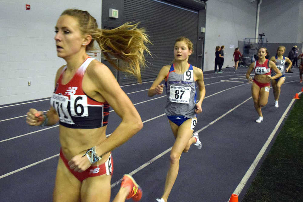 Photo courtesy of Boise State/Nevada Media Services Pro runner Alycia Cridebring leads Boise State's Allie Ostrander (87) in the 5,000 meters UW Invite at the Dempsey Indoor in Seattle on Friday. Pro runner Marisa Howard (484) and Boise State's Minttu Hukka trail. Ostrander would finish second in the race.