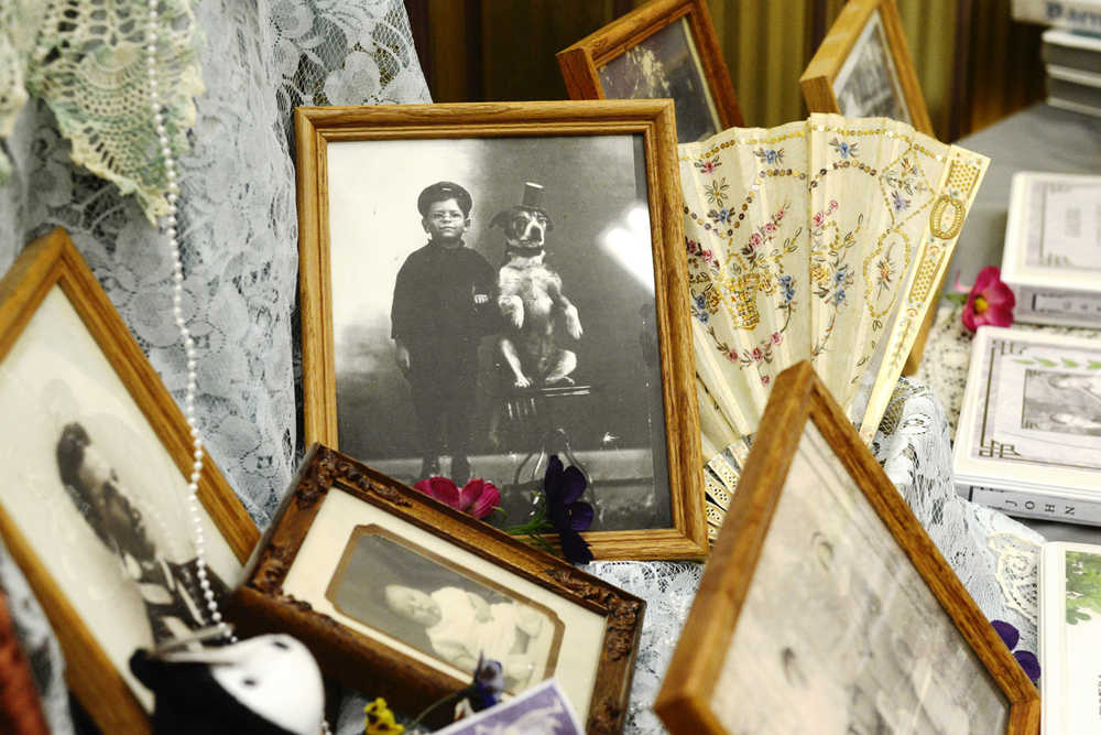 Ben Boettger/Peninsula Clarion Albertine Joan Garner's family pictures, memorbilia, and scrap books were on display during Family Discovery Day on Saturday, Feb. 6 at the Soldotna Church of Jesus Christ of Later Day Saints. Garner has compiled 30 scrapbooks of photos and information on her family.