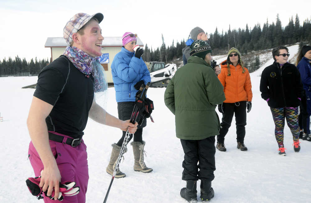 Photo by Megan Pacer/Peninsula Clarion Patrick Michels, 17, smiles shortly after crossing the finish line of a 5K race during the Women's Stud Run on Sunday, Feb. 7, 2016 at the Tsalteshi Trails in Soldotna, Alaska. Michels and several other "drag racers" participated in a race that followed the main event.