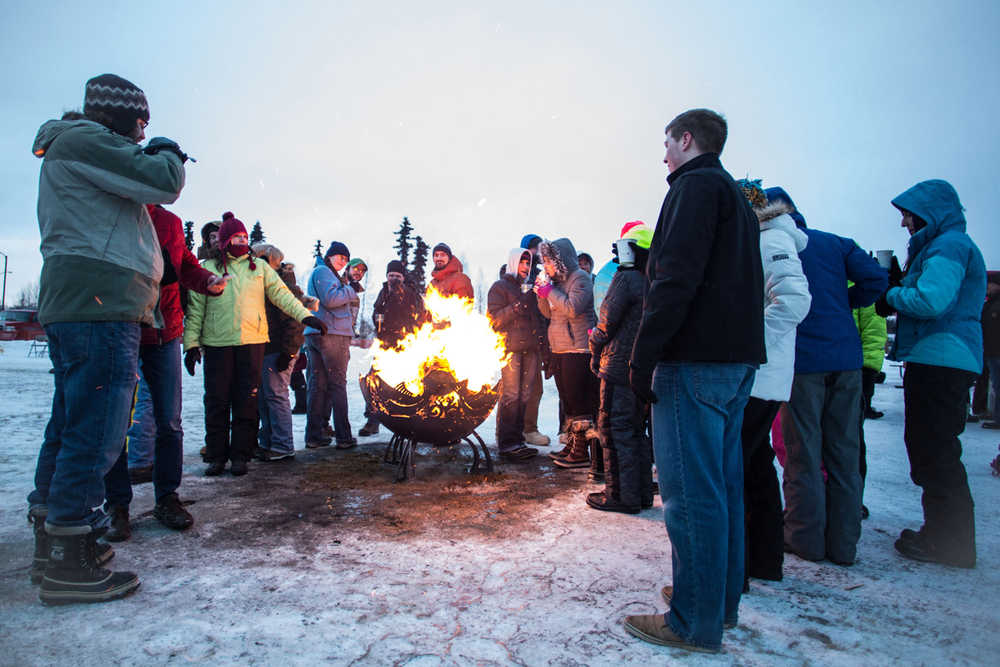 Photo by Lee Kuepper/courtesy of City of Soldotna In this photo taken Feb. 7, 2015, crowds draw closer to the bonfires as the Frozen River Festival winds down at Soldotna Creek Park in Soldotna, Alaska.
