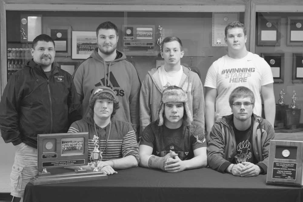 Photo by Joey Klecka/Peninsula Clarion (From left to right) Top row: Kenai Central coach John Marquez, Zach Koziczkowski, Draiden McMinn and David Beck. Bottom row: Toby Randall, Andrew Welborn and Connor Johnson.