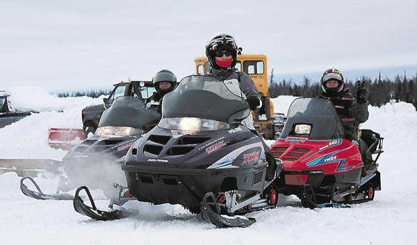 File photo In this Feb. 25, 2012 file photo, snow machine riders get ready to participate in the 8th annual Way Out Women ride in the Caribou Hills outside Ninilchik, Alaska.