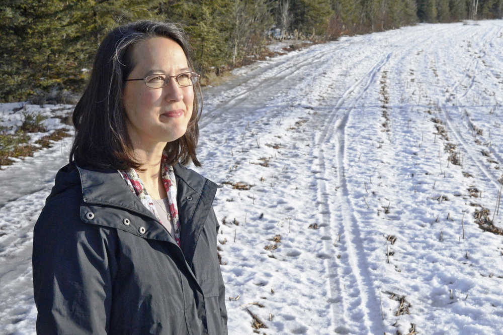 New Central Peninsula Gardening Club President Renae Wall stands beside the field where she and her husband have planted buckwheat as winter ground cover. Wall is uncertain what she'll plant in the spring.