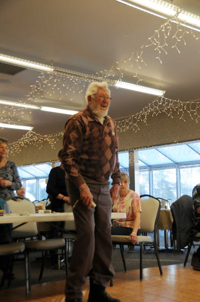 Photo by Elizabeth Earl/Peninsula Clarion Ray Nickelson watches carefully for his results on Wii Bowling during the Senior Olympics Tuesday, Feb. 16, 2016 at the Kenai Senior Center.