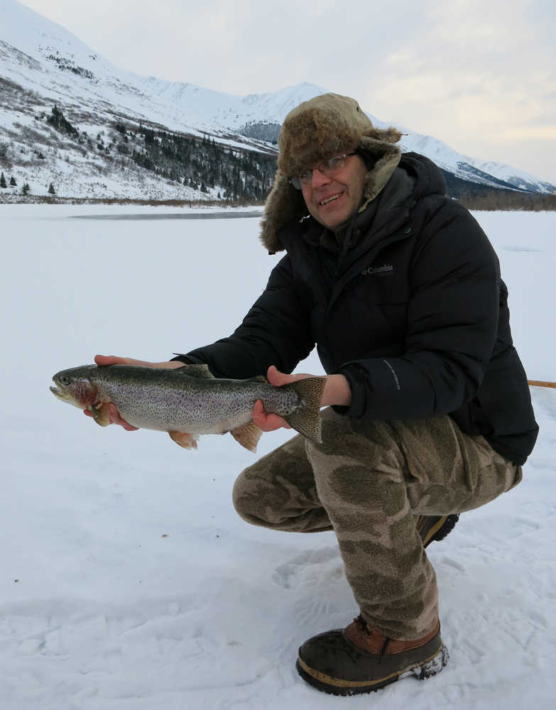 Dave Atcheson displays the best part of an ice fishing outing: fresh fish in the winter. (Photo courtesy Dave Atcheson)
