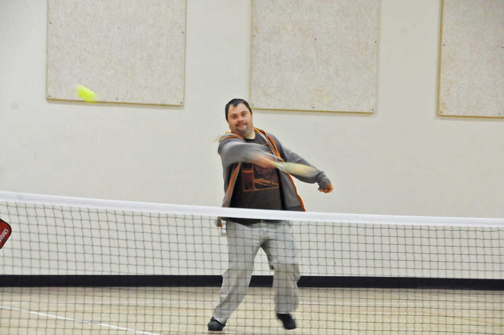 Photo by Elizabeth Earl/Peninsula Clarion Kyle Heffner takes a swing during a game of pickleball targeted specifically for the adaptive population on Feb. 18. The games, organized by Hope Resources in Soldotna and known as "Adaptive Pickleball," started Feb. 11 and will go on through March.