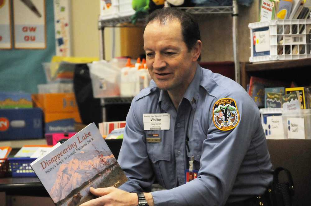 Photo by Elizabeth Earl/Peninsula Clarion Mick Wykis reads to a class at Mountain View Elementary School in Kenai during the annual community reading event on Friday, Feb. 26, 2016,