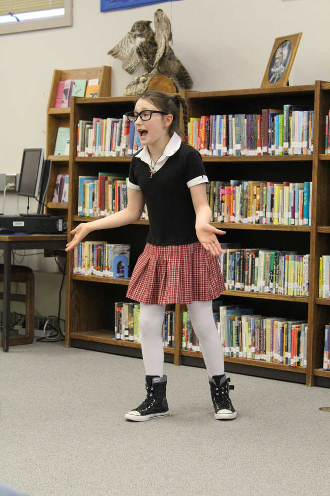 Nikiski North Start fourth-grader Leora McCaughey performs "Double Feature Teacher" for her encore performance in the library at the Kenai Peninsula Borough School District Forensics Competition on Saturday, Feb. 27. Leora took first place in the fourth grade humorous poetry category.