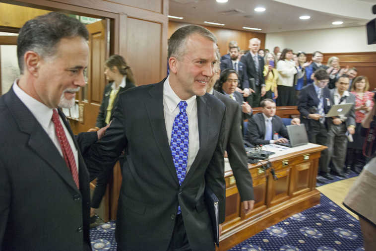 Sen. Dan Sullivan heads toward the podium in the state House before his annual address to a joint session of the Alaska Legislature on Monday, Feb. 29, 2016, in Juneau, Alaska. (AP Photo/Rashah McChesney)