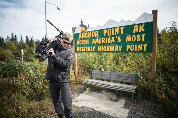 Photo courtesy Lee Kuepper/Kenai Creative Buck Kunz, the lead videographer for the new media and advertising firm Kenai Creative, hauls out some of his equipment after a shoot near Anchor Point.