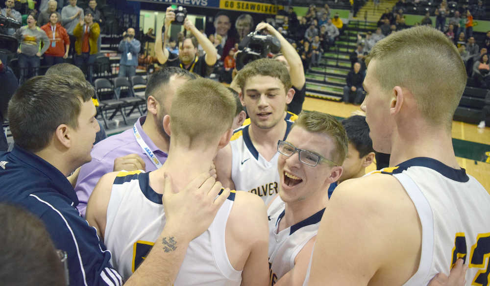 Photo by Joey Klecka/Peninsula Clarion The Ninilchik boys celebrate winning the Class 1A state tournament championship Saturday over Nikolaevsk. The title is the first for the Ninilchik boys in school history.