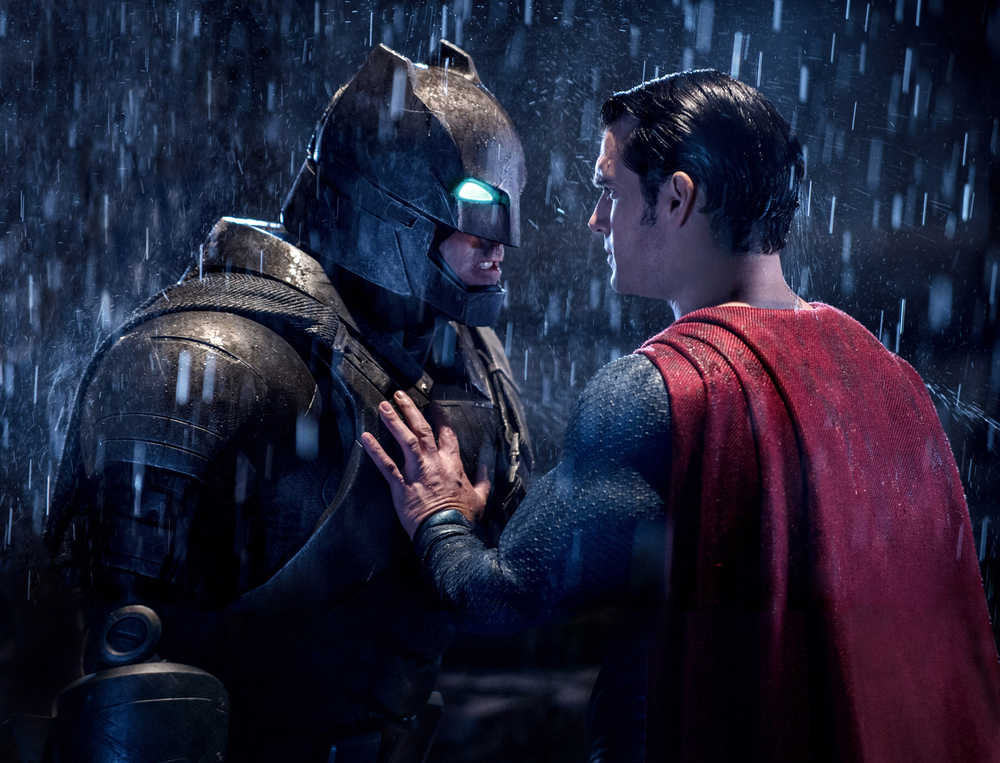 This image released by Warner Bros. Pictures shows Ben Affleck, left, and Henry Cavill in a scene from, "Batman v Superman: Dawn of Justice."  (Clay Enos/Warner Bros. Pictures via AP)