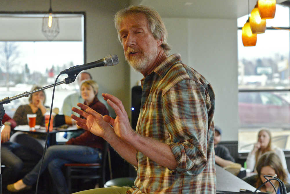 Storyteller James Bennett relates a travel story during a storytelling evening on Friday, April 1 at Odie's Deli in Soldotna.