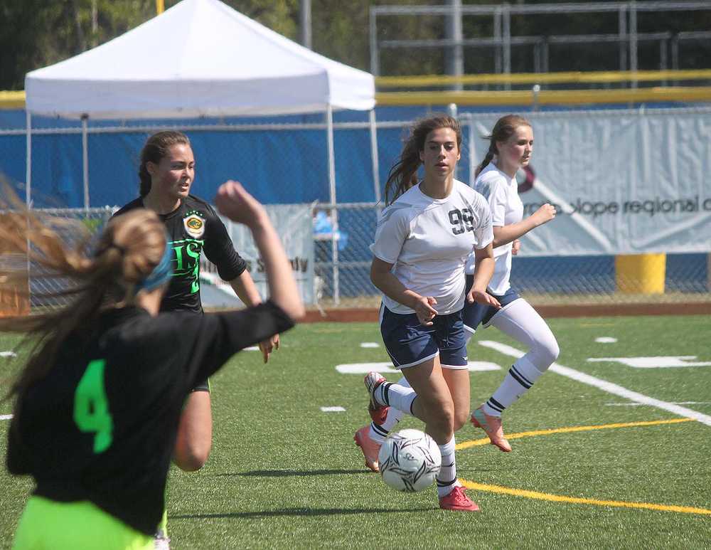 Photo by Joey Klecka/Peninsula Clarion Soldotna senior Reagan Schoessler looks for the ball against the Colony Knights at last year's state soccer tournament in Anchorage.