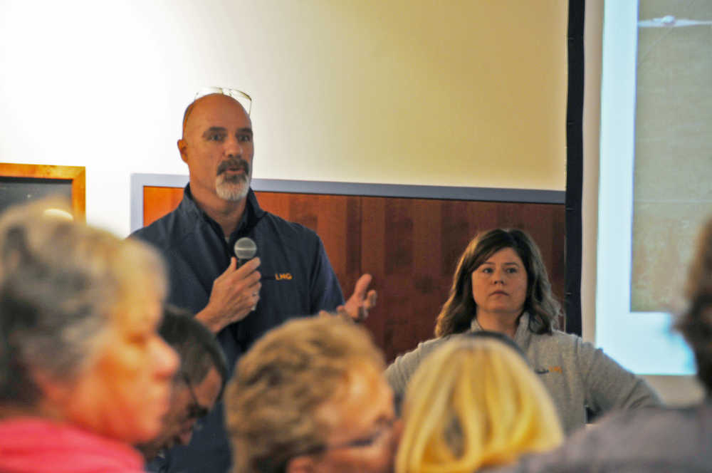 Photo by Elizabeth Earl/Peninsula Clarion Matt Horneman, the deputy lands manager for the Alaska LNG Project, updates a group of Nikiski residents during a community meeting at the Kenai Visitors and Cultural Center on Thursday, April 16, 2016. In response to a question about land purchases, Horneman said the project managers have already contacted everyone whose lands they intend to buy for the project for now.