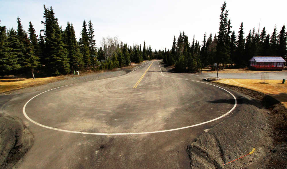 This April 21 photo shows the cul-de-sac at the end of Kenai's VIP Drive, which the city paved in 2014. Kenai administrators billed cul-de-sac residents - whom they said had requested the paving by petition - for a share of the cost, creating a dispute with residents who denied requesting the paving. The dispute was resolved Wednesday with an agreement that reduced the cost to residents.