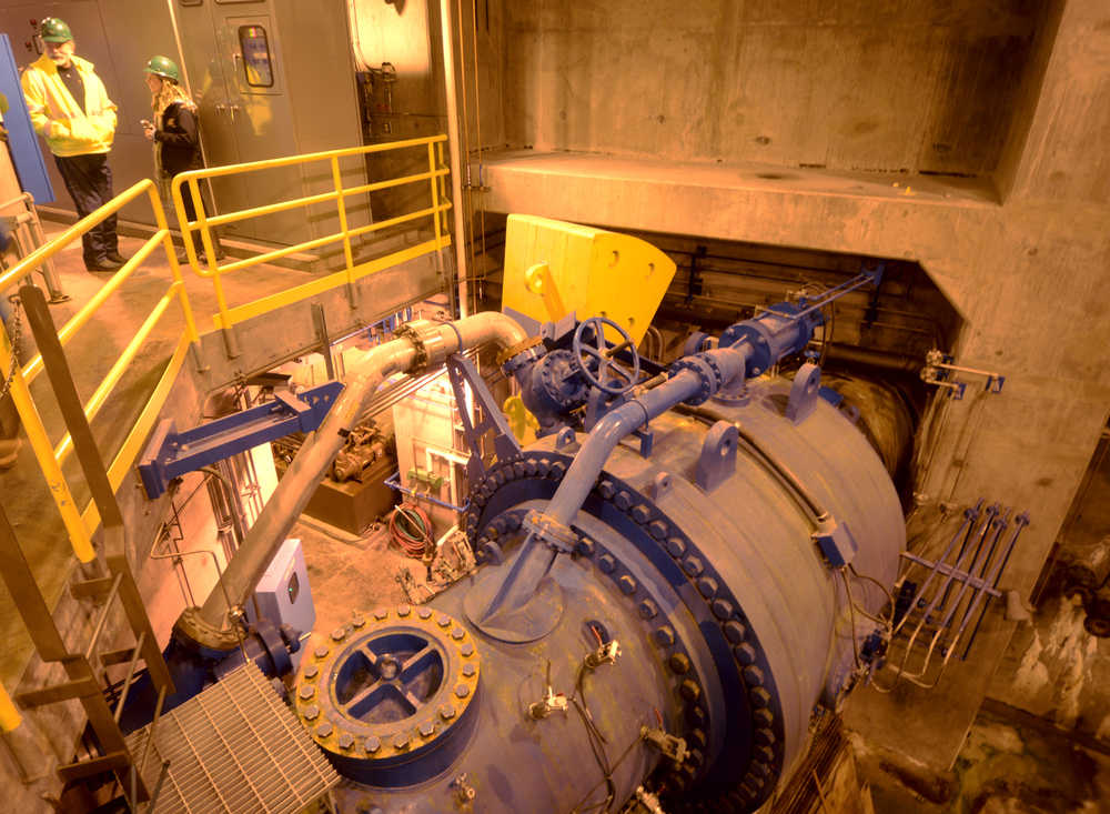 After flowing from the lake through an approximately 19,152 foot tunnel from Bradley Lake, water enters the power station through a large blue pipe, photographed on Friday, April 15 at the Bradley Lake Hydroelectric plant. The water will spin a pair of turbines, generating about 376 gigawatt hours of electricity per year.