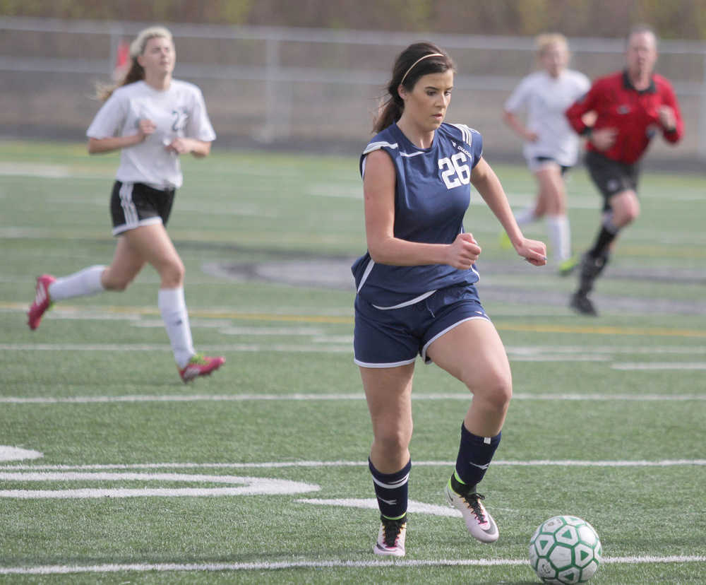 Soldotna sophomore Whitney Wortham drives the ball down the field during a 2-1 win over Colony April 23 at Colony High School.