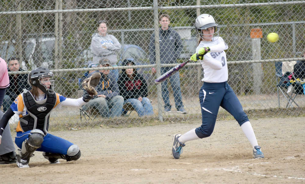Photo by Jeff Helminiak/Peninsula Clarion Soldotna left fielder Jazi Larrow doubles home two runners to give the Stars an 11-0 lead over Kodiak in the bottom of the second inning Friday at the Soldotna Little League fields.