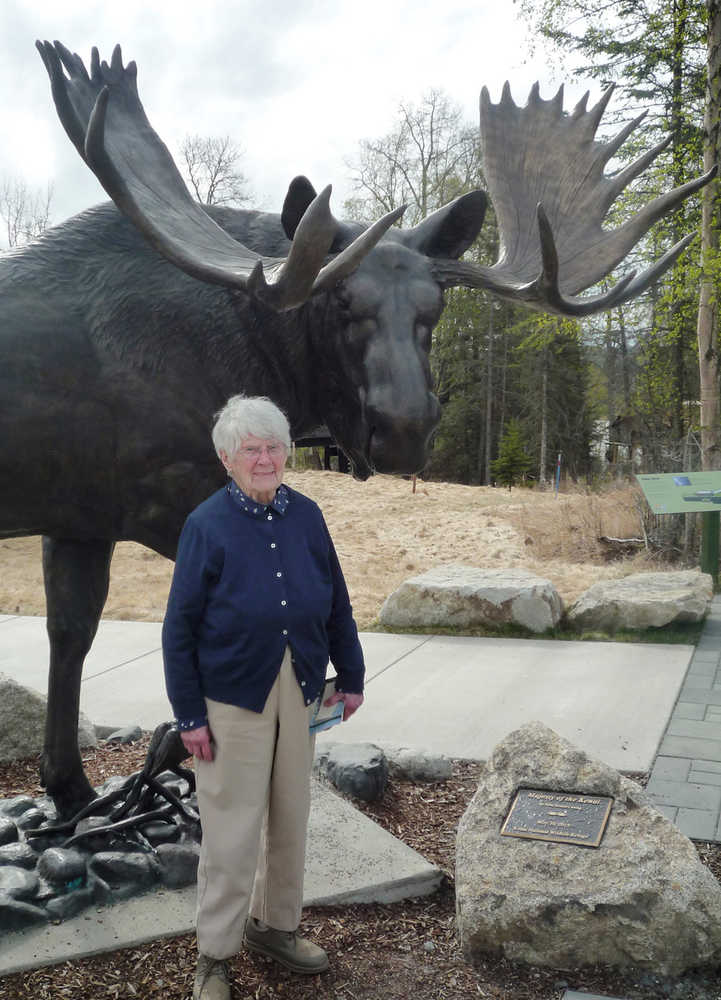 Marge Mullen - homesteader, community builder, and conservationist - in front of "Majesty of the Kenai" at the Kenai National Wildlife Refuge Visitor Center. (Photo by Walter Ward)