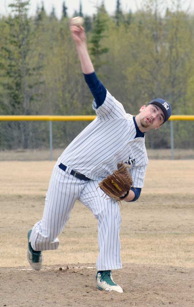 Photo by Jeff Helminiak/Peninsula Clarion Soldotna pitcher Hunter Thompson delivers home against Homer on Thursday at the Soldotna Little League fields.