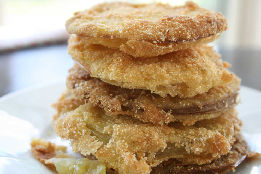 Fried green tomatoes are versatile. Use them for appetizers, a light entrée, a side dish, in sandwiches or sliced and served on top of salads.