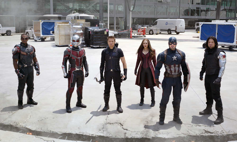 In this image released by Disney, Anthony Mackie, from left,  Paul Rudd, Jeremy Renner, Elizabeth Olsen, Chris Evans and Sebastian Stan appear in a scene from "Captain America: Civil War." (Disney-Marvel via AP)