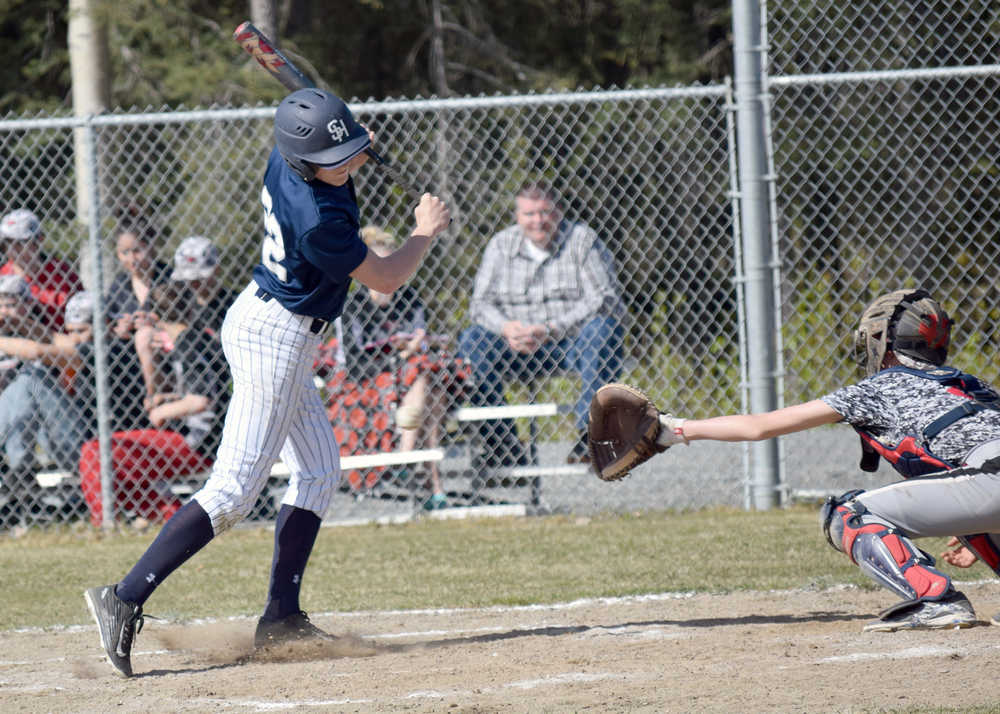 Photo by Jeff Helminiak/Peninsula Clarion Soldotna's Cody Quelland is hit by a pitch in the third inning of Thursday's 9-2 victory over Houston at Soldotna LIttle League fields.