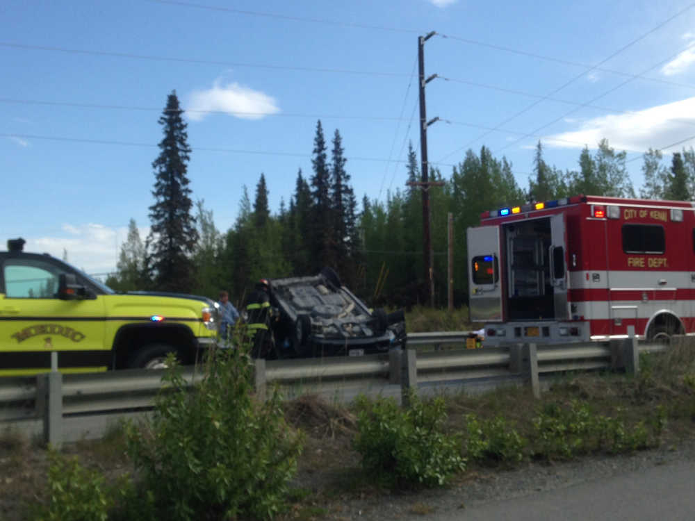 Photo by Elizabeth Earl/ Peninsula Clarion The Nikiski Fire Department, Kenai Police and Kenai Fire departments are responding to a wreck involving multiple vehicles at the intersection of the Kenai Spur Highway and Beaver Loop Road. One of the vehicles appears to have been flipped upside down.