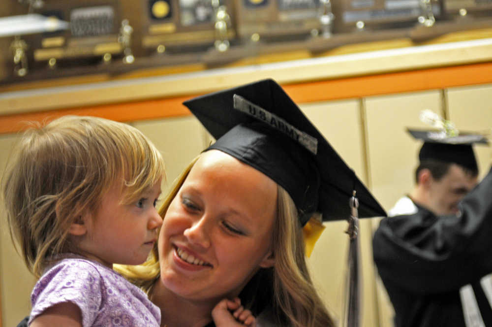 Photo by Elizabeth Earl/Peninsula Clarion Daisy Schwenke, who graduated from Nikiski Middle-High School in Nikiski, Alaska, on Monday, May 16, 2016, said she intends to go into the U.S. Army after graduation. She said she aims to become a military police officer.