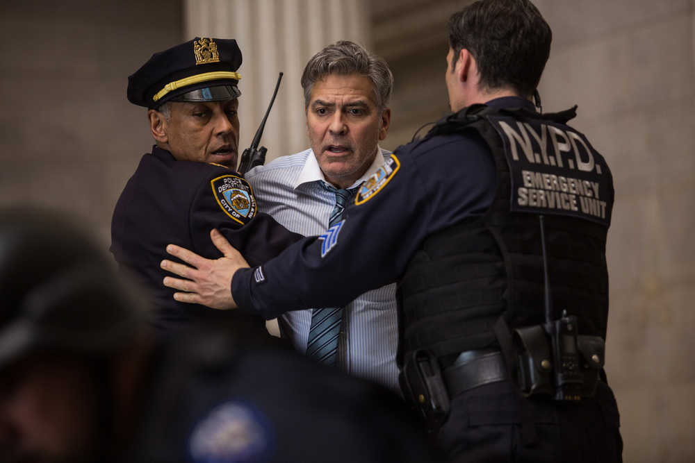 This image released by Sony Pictures shows George Clooney in a scene from "Money Monster," opening in theaters nationwide on May 13. (Atsushi Nishijima/TriStar Pictures-Sony Pictures via AP)
