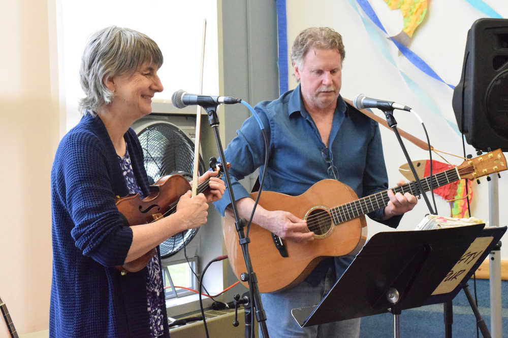 Photo by Megan Pacer/Peninsula Clarion Susan Biggs and Jack Wills perform for an audience of Heritage Place residents, staff, family and friends during this year's Return of the Salmon event Friday, May 20, 2016 at Heritage Place in Soldotna, Alaska.
