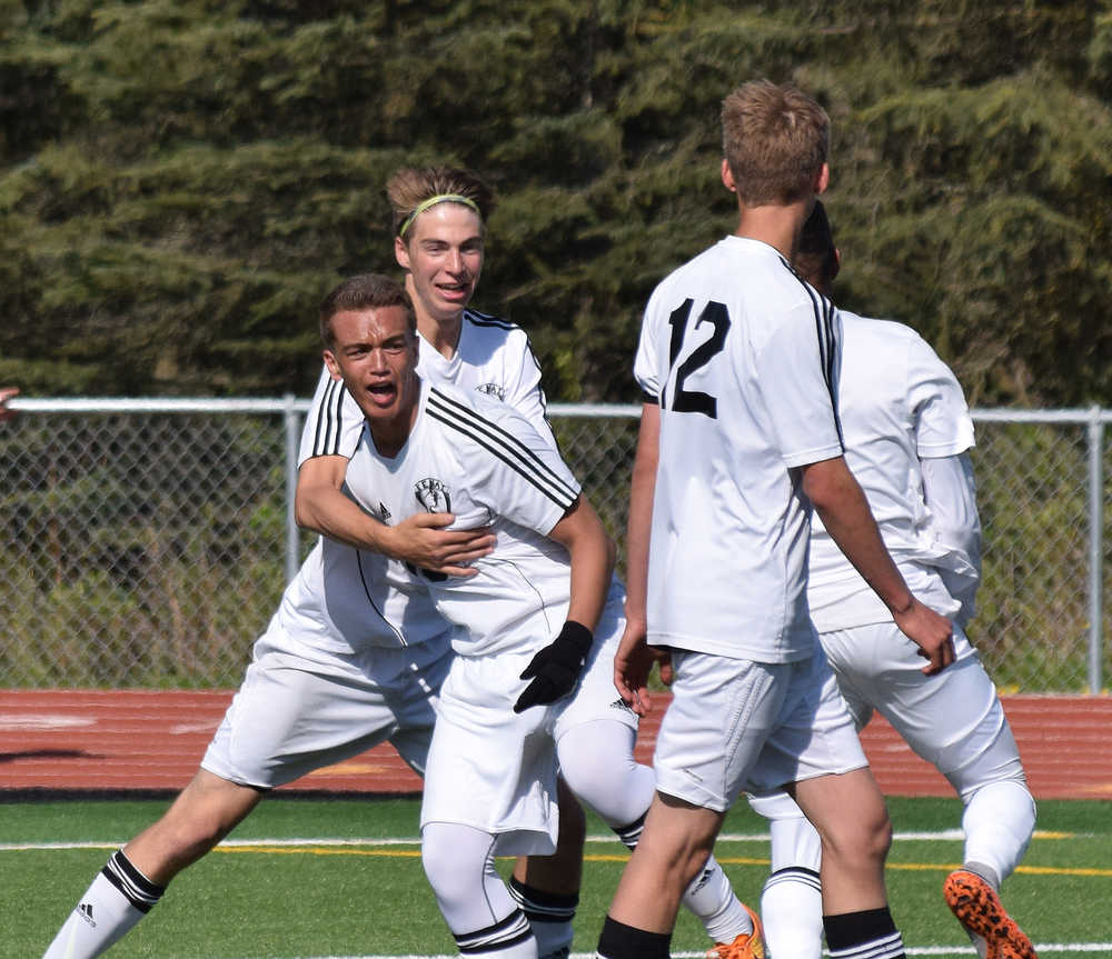 Photo by Joey Klecka/Peninsula Clarion Kenai Central sophomore Braydon Goodman (10) celebrates his goal in the first half of Saturday's Northern Lights Conference championship game at Ed Hollier Field in Kenai.