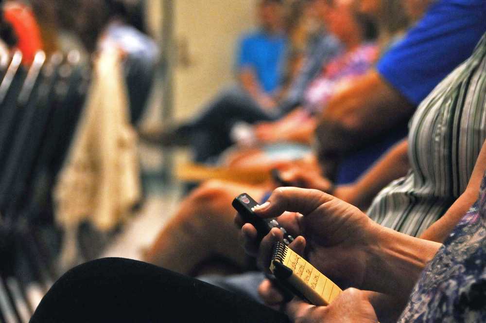 Photo by Elizabeth Earl/Peninsula Clarion Attendees at the second Heroin Town Hall event at the Challenger Learning Center in Kenai, Alaska on Thursday, May 26, 2016, answered questions about their knowledge of prescription drugs and their opinions about how the heroin addiction problem in the community should be addressed.