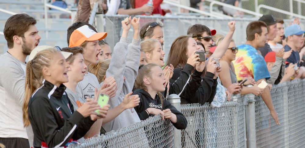 Photo by Joey Klecka/Peninsula Clarion A pro-Kenai Central crowd cheers on the Kardinals at the state soccer semifinal Friday featuring the Kenai and Service boys teams at Service High School.
