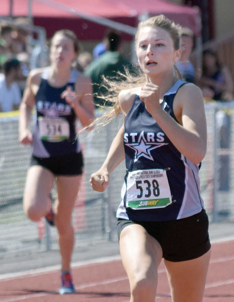 Photo by Joey Klecka/Peninsula Clarion Soldotna senior Daisy Nelson (538) races down the finishing stretch of the 4A girls 400-meter dash Saturday at the state track and field championships at Dimond Alumni Field in Anchorage.