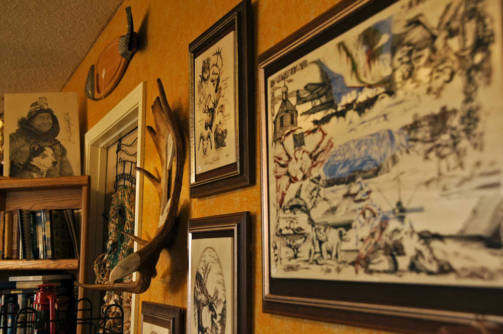 Photo by Elizabeth Earl/Peninsula Clarion Pictureframes and a moose's rack hang in the Ye Olde Curiosity Shoppe on Monday, May 30, 2016 in Kenai, Alaska. The shop recently moved from its old location near the Peninsula Job Center to a new building on the Kenai Spur Highway across from Salvation Army.