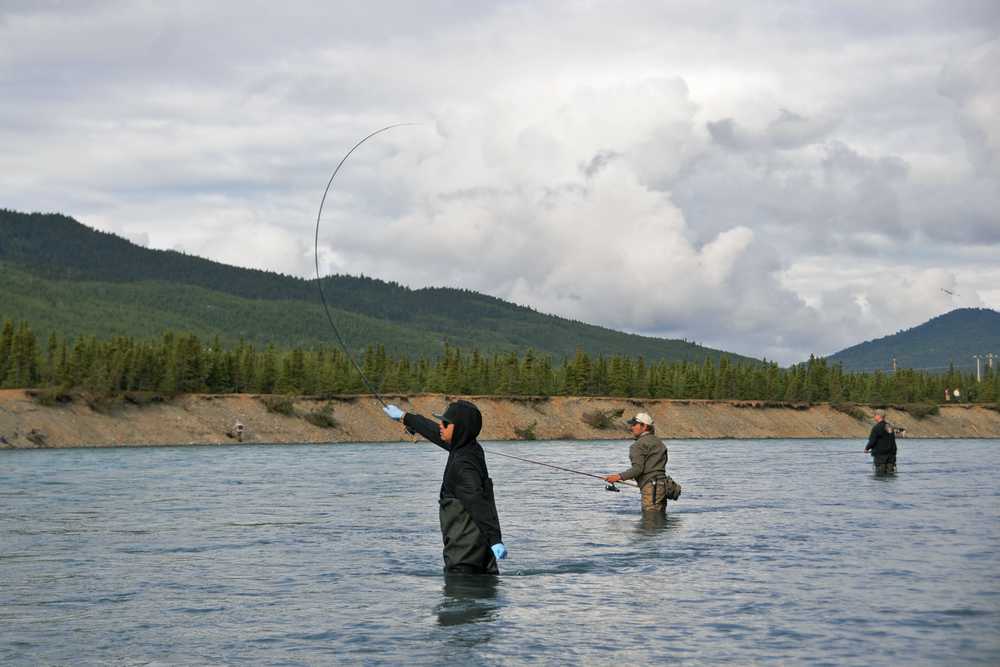 Photo by Elizabeth Earl/Peninsula Clarion Fishermen on the Kenai River near the Russian River ferry cast for sockeye salmon on Sunday, June 12, 2016. The river opened for sockeye fishing at 12:01 a.m. Saturday, June 11.