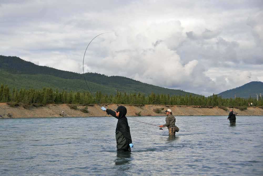 Photo by Elizabeth Earl/Peninsula Clarion Fishermen on the Kenai River near the Russian River ferry cast for sockeye salmon on Sunday, June 12, 2016. The river opened for sockeye fishing at 12:01 a.m. Saturday, June 11.