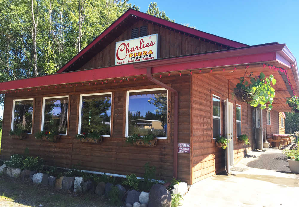 Photo by Megan Pacer/Peninsula Clarion Charlie's Pizza faces the Kenai Spur Highway in this Wednesday, June 15, 2016 photo in Nikiski, Alaska. Owner Steve Chamberlain will close the restaurant in December and begin work to open greenhouses and a nursery on the property.